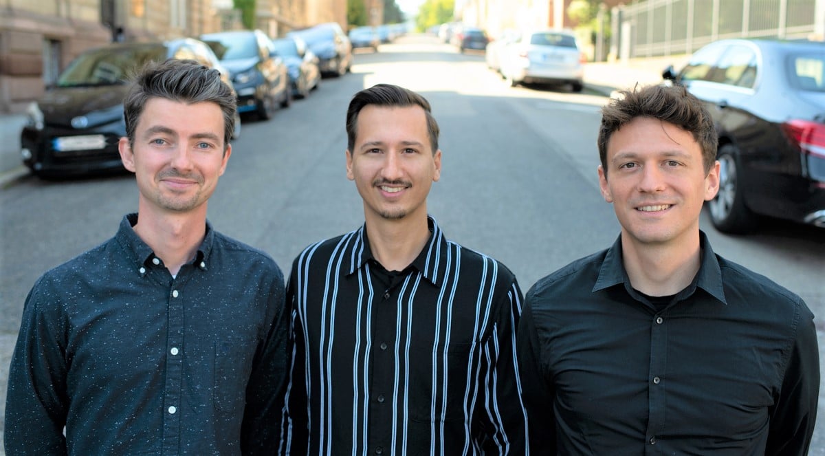 picture of the three vialytics founders on a road in Stuttgart