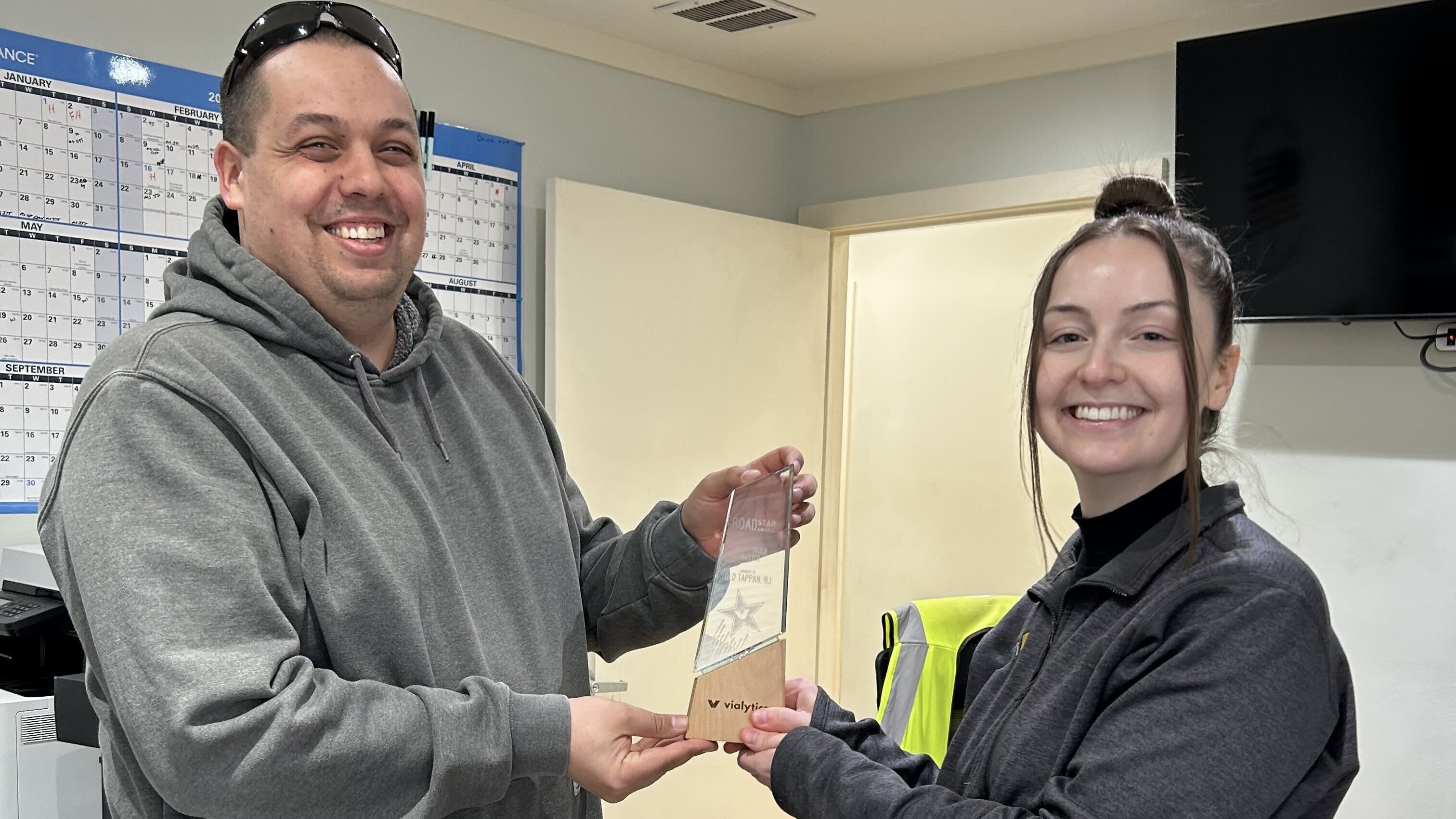 Old Tappan, NJ officials holding the 2025 vialytics RoadStar Award for Work Order Master excellence in road maintenance.